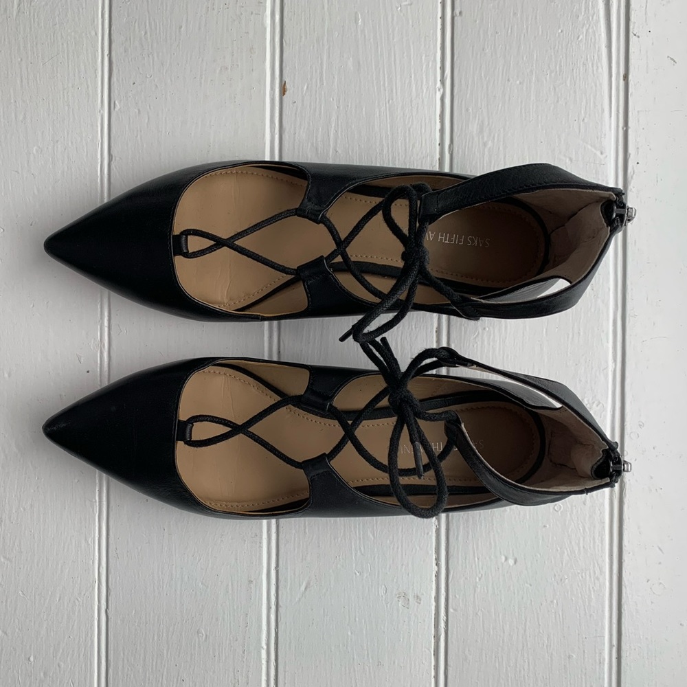 Saks black pointy flats size 7